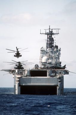 A CH-53D Sea Stallion helicopter attached to Marine Medium Helicopter Squadron 261 (HMM-261) lifts off from the flight deck of the amphibious assault ship USS SAIPAN (LHA-2) during Operation Sharp Edge. Marines of the 22nd Marine Expeditionary Unit (22nd MEU) are being sent to the U.S. Embassy in Monrovia, Liberia, to augment security and evacuate U.S. and foreign nationals from the fighting between government and rebel forces