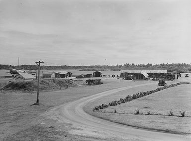 [View of road leading to several buildings]