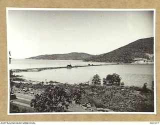 TATANA ISLAND, 1943-12-01. CAUSEWAY FROM THE MAINLAND TO TATANA ISLAND, IT IS APPROXIMATELY 900 YARDS LONG AND WAS CONSTRUCTED BY THE AMERICAN FORCES. THIS CAUSEWAY PROVIDED A LINK BETWEEN THE ..