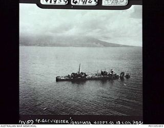CAPE GLOUCESTER, NEW BRITAIN, 1943-09-04. PARTLY SUBMERGED JAPANESE DESTROYER LYING IN SHALLOW WATER PHOTOGRAPH BY A BEAUFIGHTER OF NO 30 SQUADRON RAAF DURING A SWEEP ALONG THE COAST NEAR CAPE ..