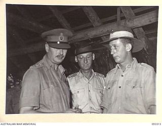 LAE AREA, NEW GUINEA, 1945-06-28. HIS ROYAL HIGHNESS, THE DUKE OF GLOUCESTER, GOVERNOR-GENERAL OF AUSTRALIA, (1) INSPECTING THE HOBBY HUT DURING HIS VISIT TO 112 CONVALESCENT DEPOT. THE ..