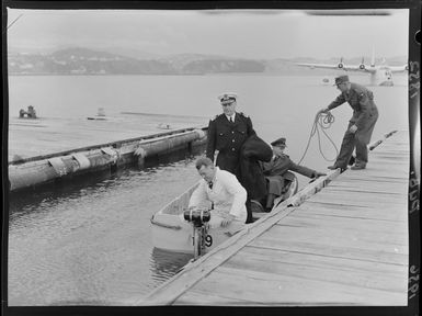 New Zealand chief of naval staff (rear-admiral) J E H McBeath with chief of air staff (air vice-marshal) C E Kay on their way to Fiji on a flying boat