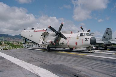 Close-in view of a C-2A Greyhound aircraft of Fleet Logistic Support Squadron Thirty (VRC-30) tied down on the flight deck of the nuclear-powered aircraft carrier USS ABRAHAM LINCOLN (CVN 72). The LINCOLN is here to take part in Operation RIMPAC 2000