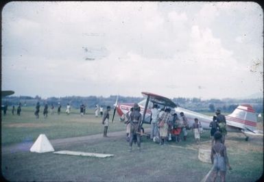 A Lutheran Mission plane on airstrip : Minj Station, Wahgi Valley, Papua New Guinea, 1954 / Terence and Margaret Spencer