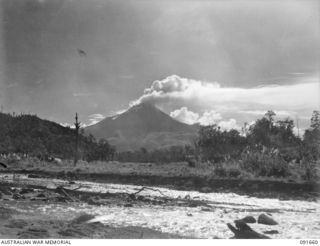 TOROKINA, BOUGAINVILLE, 1945-05-05. MT BAGANA, AN ACTIVE VOLCANO ON THE ISLAND. 3 MILITARY HISTORY FIELD TEAM IS OPERATING IN THE AREA