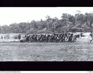 MAPRIK, NEW GUINEA, 1945. ONE OF A SERIES OF PHOTOGRAPHS PRODUCED IN THE HOUSE OF REPRESENTATIVES, CANBERRA, ACT, ON 1 JUNE 1945 BY THE RT HON A W FADDEN, LEADER OF THE AUSTRALIAN COUNTRY PARTY IN ..