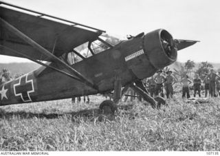 KOKODA AIRSTRIP, PAPUA. A STINSON AMBULANCE AIRCRAFT WHICH WAS USED FOR THE EVACUATION OF CASUALTIES. SOME TRIPS WERE ALSO MADE FROM NEARBY MYOLA