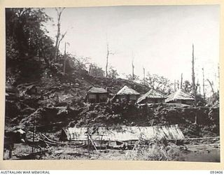 BARGES HILL, CENTRAL BOUGAINVILLE. 1945-06-27. THE AUSTRALIAN NEW GUINEA ADMINISTRATIVE UNIT CAMP ON THE EAST DOIABI RIVER, NUMA NUMA TRAIL