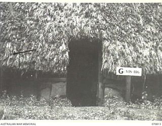 PORT MORESBY, NEW GUINEA, 1944-03-08. THE ENTRANCE TO "G" (VISUAL TRAINING), HEADQUARTERS, NEW GUINEA FORCE