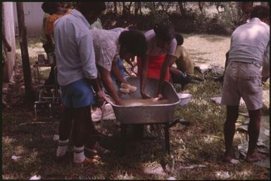 Malaria Control Service national staff prepare an earth oven for a party (6) : Papua New Guinea, 1976-1978 / Terence and Margaret Spencer