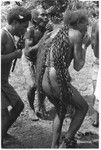 Men play panpipes to accompany the sango dance at Ngarinaasuru