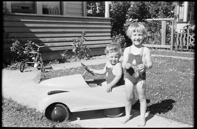 Raymond and Margaret Hare with pedal car