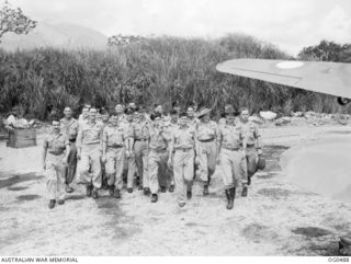 VIVIGANI, GOODENOUGH ISLAND, PAPUA. 1944-01-18. AN INFORMAL GROUP PORTRAIT OF WEST AUSTRALIAN MEMBERS OF NO. 6 (BEAUFORT) SQUADRON RAAF WHICH FIGURED PROMINENTLY IN THE STRIKES ON RABAUL