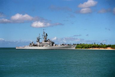 The guided missile cruiser USS GRIDLEY (CG-21) enters the channel as it arrives for a visit to Naval Station, Pearl Harbor, Hawaii.