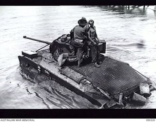 BOUGAINVILLE. 1945-04-04. A MATILDA TANK OF 8 TROOP, B SQUADRON, 2/4 ARMOURED REGIMENT, CROSSING THE PURIATA RIVER TO JOIN 7 AND 9 TROOPS AT 25 INFANTRY BATTALION. THE TANKS MOVED FROM TOKO ALONG ..