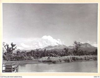 TOROKINA, BOUGAINVILLE. 1945-10-20. MOUNT BAGANA IN HEADQUARTERS 3 DIVISION AREA, VIEWED FROM THE REINI RIVER