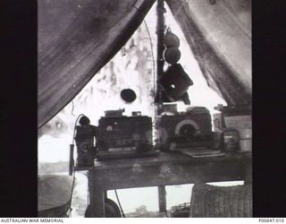 MILNE BAY, PAPUA, C.1942 - 43. INTERIOR OF WIRELESS TELEGRAPHY TENT AT NO. 37 RAAF RADAR STATION. (DONOR - T.G. JONES)