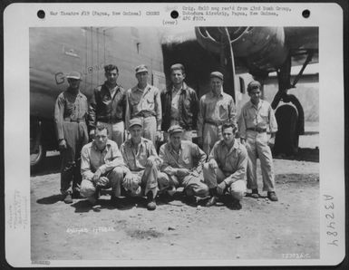 Captain Sausville and crew of the 65th Bomb Squadron, 43rd Bomb Group, pose by the Consolidated B-24 "Geraldine" at Dobodura Airstrip, Papua, New Guinea. 17 February 1944. (U.S. Air Force Number 72373AC)