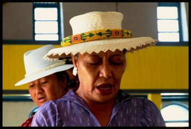 Woman wearing rito hat, Cook Island Christian Church, Manihiki, Cook Islands