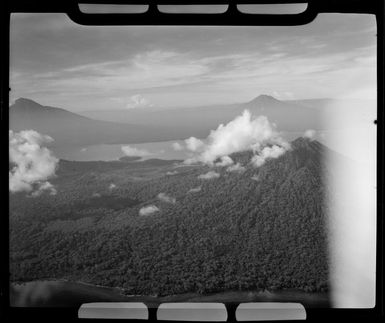 Mt Lolobau, 3058 feet high, (Mt Ulawun (Father), 7376 feet high, and Mt Bamus (South Son), 7446 feet high, New Britain, Papua New Guinea