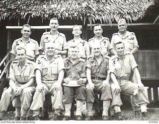 MADANG, NEW GUINEA. 1944-08-29. OFFICERS OF HEADQUARTERS, MADANG BASE SUB AREA. ISDENTIFIED PERSONNEL ARE:- VX11412 MAJOR V.M. BARKER GII (1); VX36 LIEUTENANT-COLONEAL N.A. NORRIS, ASSISTANT ..