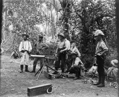 Naval mchine gun crew with maxim gun in Samoa