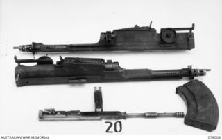 LAE, NEW GUINEA. 1944-09-18. THE EFFECTS OF TROPICAL CONDITIONS ON VARIOUS PARTS OF BREN GUNS USING JAPANESE SMALL ARMS OIL. THESE TRIALS OF CORROSION PREVENTATIVE LUBRICANTS WERE CARRIED OUT BY ..