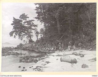 FAURO ISLAND, BOUGAINVILLE AREA. 1945-11-12. JAPANESE WORKING PARTY BUILDING A CAUSEWAY AND ROAD ALONG THE COAST. JAPANESE ARMY AND NAVAL TROOPS ARE CONCENTRATED ON FAURO ISLAND UNDER THE CONTROL ..