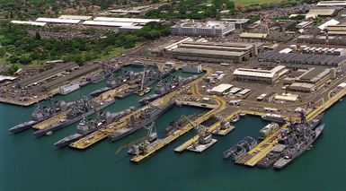 An aerial view of US Navy ships staging at NAS Pearl Harbor's Controlled Industrial Area in support of the exercise RIMPAC '98