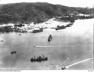 LANGEMAK BAY, NEW GUINEA. 1944-04-03. AN AERIAL PHOTOGRAPH INDICATING THE PORT DEVELOPMENT AND THE INCREASED MOVEMENT OF SUPPLIES THROUGH THE AREA