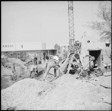 Group of men digging on a construction site, Port Vila, New Hebrides, 1969 / Michael Terry