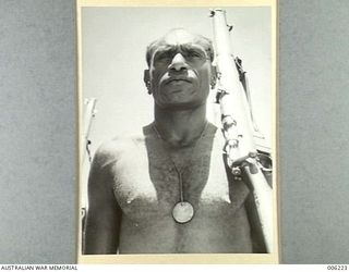 PORT MORESBY. PAPUAN INFANTRY MAN. (NEGATIVE BR R. PEARSE)