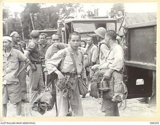 TOROKINA, BOUGAINVILLE. 1945-09-14. SOME OF THE MEMBERS OF THE PARTY OF 79 CHINESE WHO ARRIVED BY TRUCK AT TOROKINA COMPOUND. FORMER PRISONERS OF THE JAPANESE THEY WERE RELEASED WHEN AUSTRALIAN ..