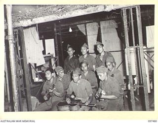 RABAUL, NEW BRITAIN. 1945-09-30. THE JAVANESE BAND GIVING THE FIRST MUSICAL PERFORMANCE AT RABAUL, AT A CONCERT ORGANISED BY THE VISITORS' AND OBSERVERS' SECTION, HEADQUARTERS 11 DIVISION, THE ..