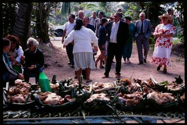 Baskets of food on a table outdoors, Rarotonga