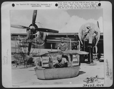 Mechanics Work On A Boeing B-29 Superfortress Which Has Blasted Tokyo At The Guam Air Depot In The Marianas Gp. (U.S. Air Force Number A58121AC)