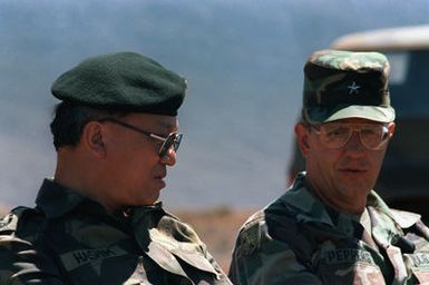 Brigadier General John S. Peppers, right, Assistant Division Commander, 25th Infantry Division, and Lieutenant General Pato Mohamed Ashim Bin Mohamed Ali, chief of the Royal Malaysian Army, observe a combined arms live fire exercise at the Pohakuloa Training Area