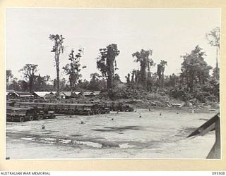 TOROKINA, BOUGAINVILLE, 1945-08-23. PANORAMA OF 8 VEHICLE PARK AUSTRALIAN ARMY ORDNANCE CORPS. (JOINS WITH 95506 AND 95507)