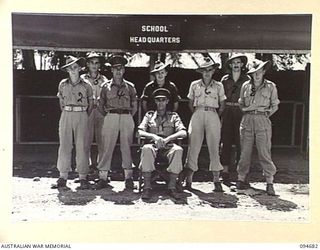 Yalu, New Guinea. Administrative Staff at the New Guinea Training School. Identified: NX161162 Captain (Capt) J A Shimeld (1); NX403 Major V E Dowdy (2); QX43799 Capt C W Young (3); VX85255 ..