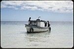 Small boat in shallow water, Munuwata Island