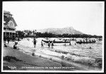 Outrigger canoes coming to shore at Waikiki Beach, Honolulu