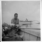 Maki in back of his boat, Taku, Mangareva