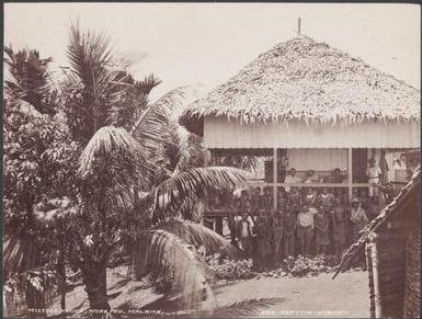 People of Nore Fou gathered on the mission house verandah, Malaita, Solomon Islands, 1906 / J.W. Beattie