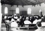 People attending the presentation by Rev. Horwell in a church