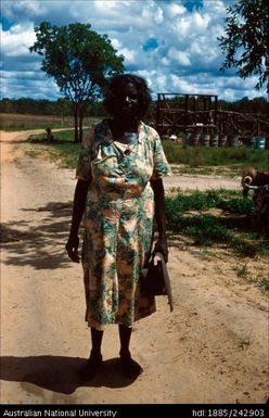 Aboriginal woman holding a hat