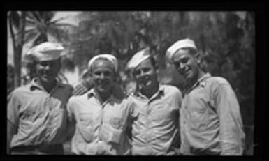 [Four U.S. Navy servicemen]