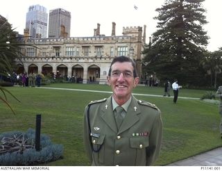 Padre Philip Raymond Anderson at Government House Sydney.  Padre Anderson came to Canberra as a child in 1965. After graduating from high school he joined the Citizen Military Forces.  He enlisted ..