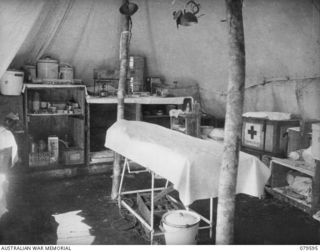 ORO BAY, NEW GUINEA. 1943-04. A SECTION OF THE INTERIOR OF THE FIRST OPERATING THEATRE AT THE MAIN DRESSING STATION, 10TH FIELD AMBULANCE, HOUSED IN ONE GS DOUBLE MARQUEE TENT