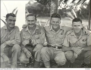 Informal group portrait of the crew of Beaufighter A19-142 of 30 Squadron RAAF, which, on 22 January 1944, met and guided an air sea rescue Catalina flying-boat to Warrant Officer (WO) J E C ..