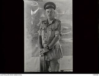 Lae, New Guinea. 1944-06-29. Portrait of Brigadier W. E. Cremor, Brigadier Royal Artillery (AIF) in his office at HQ New Guinea Force